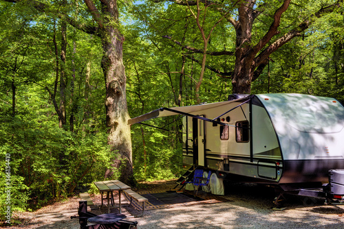 Travel trailer camping in the woods at starved rock state park illinois Fototapeta