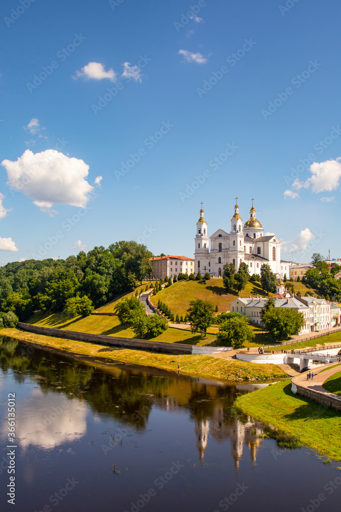 Vitebsk,Belarus - 18 July 2020 : Holy Assumption Cathedral of the Assumption on the hill and the Holy Spirit convent and Western Dvina River. Vitebsk, Belarus