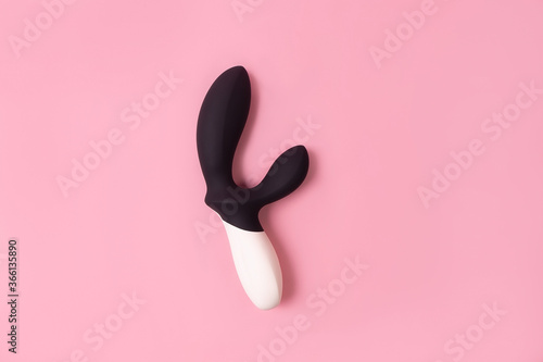 on a pink background sex product, toy for adults