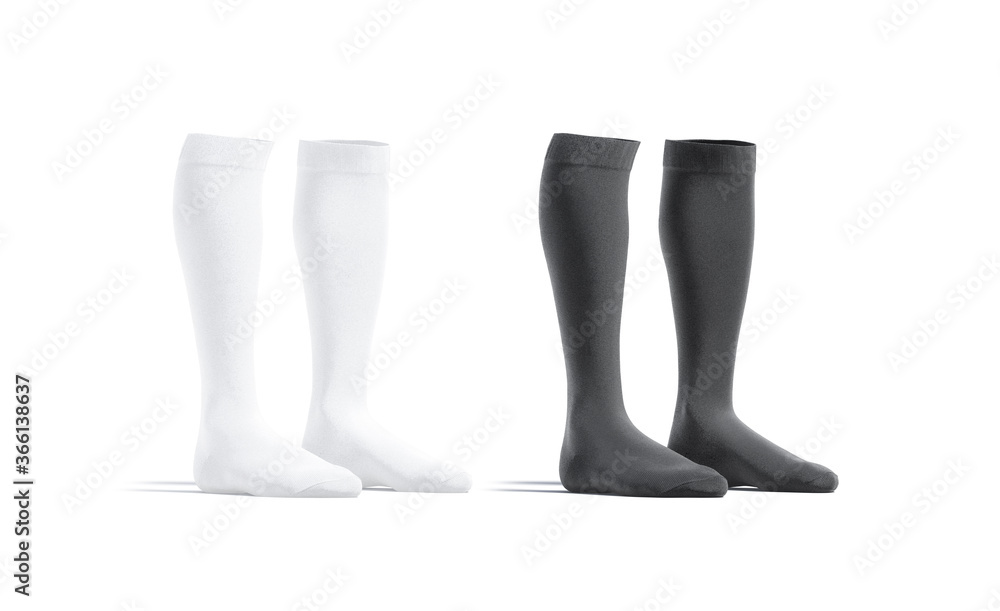 Blank black and white soccer socks mockup pair, half-turned view Blank black and white soccer socks mockup pair, half-turned view