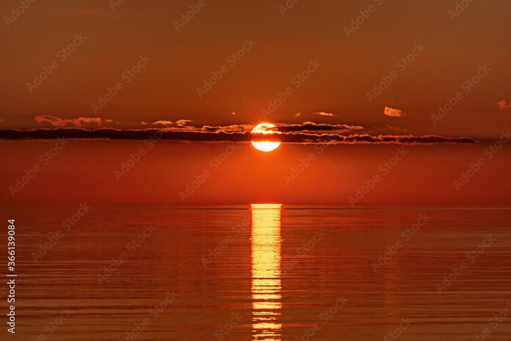 Fototapeta premium Sunset on the lake. Pskov region. Russia