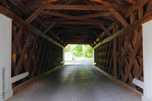 Inside view of the wood trusses in the historic wooden covered Cabin Run bridge in Plumstead, Bucks County, Pennsylvania, United States.