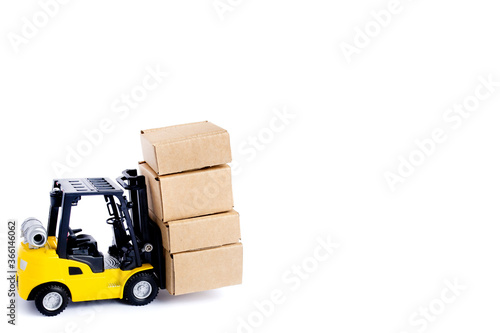 Mini forklift truck load cardboard boxes isolated on white background. Logistics and transportation management ideas and Industry business commercial concept.