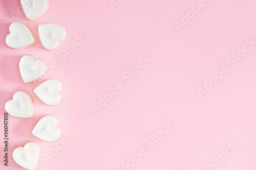 Valentine day concept, composition. Pattern made of heart shaped  wax candle on pastel pink background. Aroma candles. Flat lay, top view, copy space © prime1001