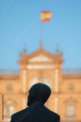 Spain, Seville, Statue of Anibal Gonzales at Plaza de Espana photo