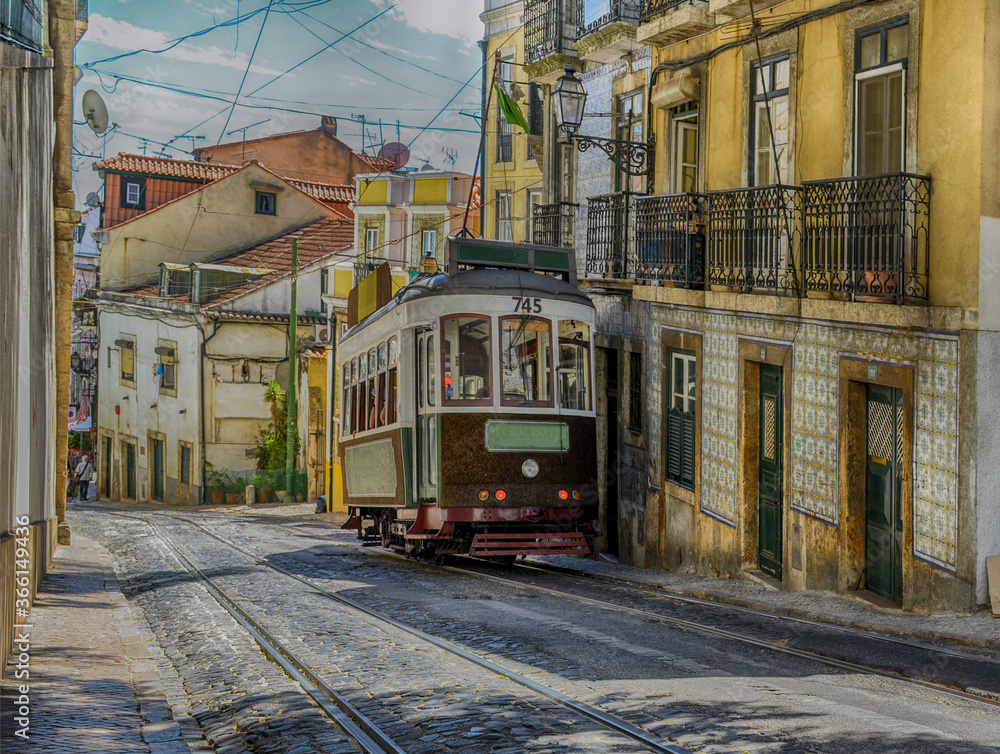 Vintage yellow tram in the city center of Lisbon, Portugal