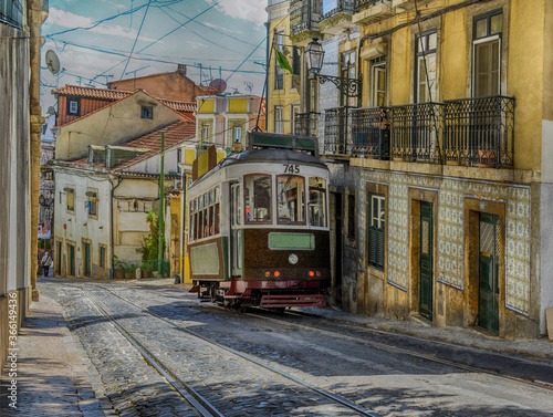 Vintage yellow tram in the city center of Lisbon, Portugal