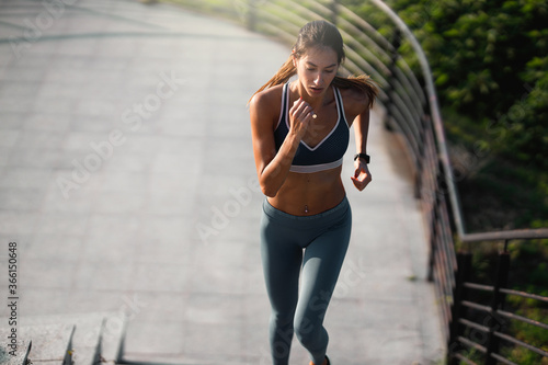 Young woman at afternoon run