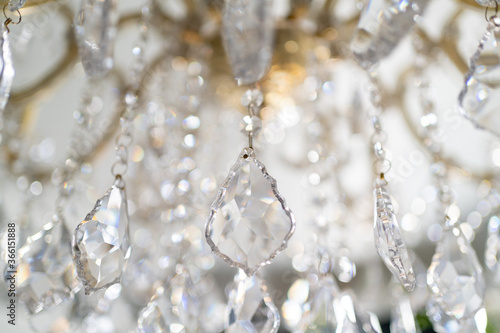 chandelier with sparkling crystal, background in bright colors