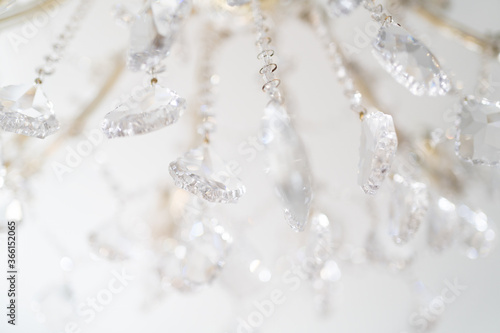 chandelier with sparkling crystal, background in bright colors
