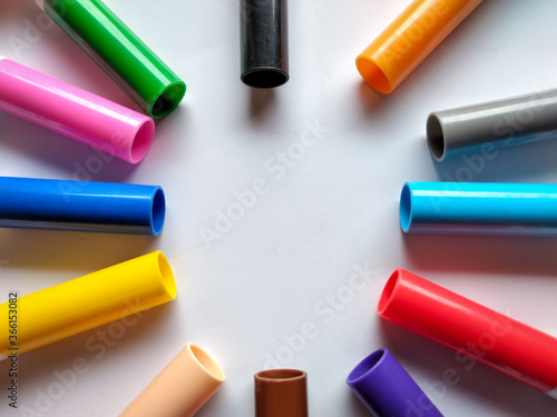 colored markers on white background