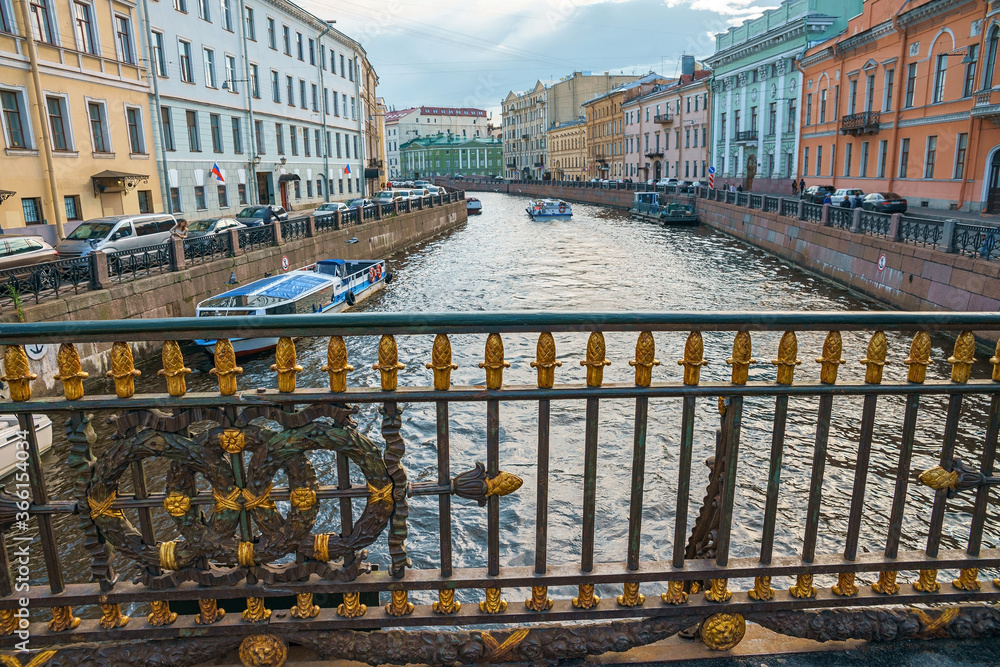 Naklejka premium Decorative fence of Great Konyushenny Bridge above Moika River. Saint Petersburg, Russia
