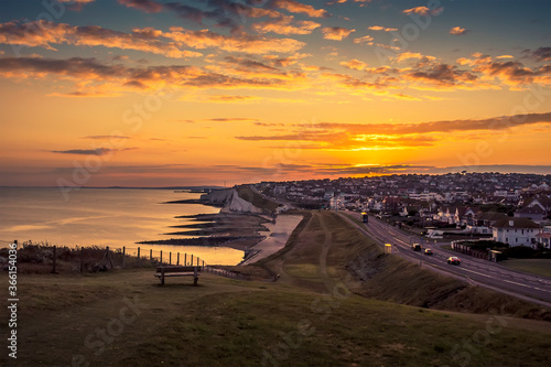 A view of the sunset from Saltdean looking towards Brighton  UK in summer