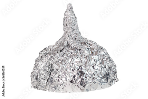 Aluminium foil hat isolated on white background, symbol for conspiracy theory and mind control protection.