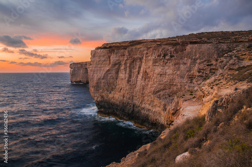 Cloudy Maltese Coastline during sunset