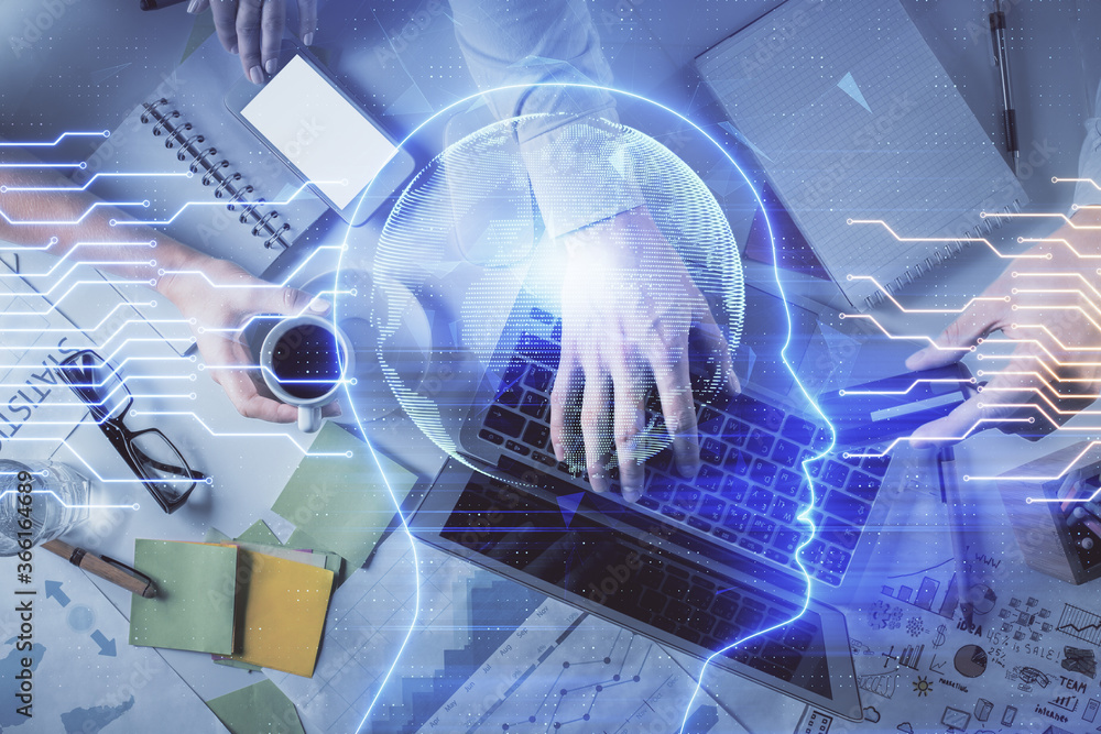 Double exposure of man and woman working together and human brain hologram drawing. Brainstorm concept. Computer background. Top View. Double exposure of man and woman working together and human brain hologram drawing. Brainstorm concept. Computer background. Top View.