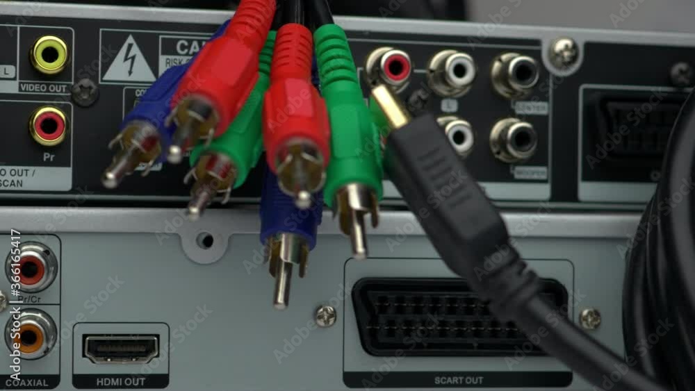 Audio Video Component RCA Connectors On The Back Side Of DVD Player And Component Video Cables Slider Shot. Audio Video Component RCA Connectors On The Back Side Of DVD Player And Component Video Cables Slider Shot.