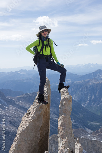 Woman On Mountain Summit