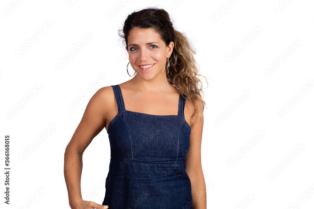 Young woman looking at camera and smiling.