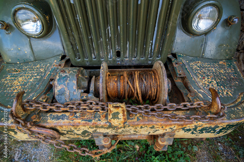 Abandoned old rusty truck in park photo