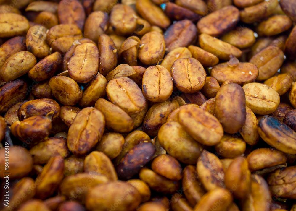 Dried coffee grains with honey process, dried directly after pulping process. Dried coffee grains with honey process, dried directly after pulping process.