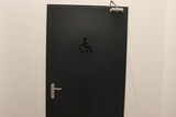 toilet rooms with symbols in business center