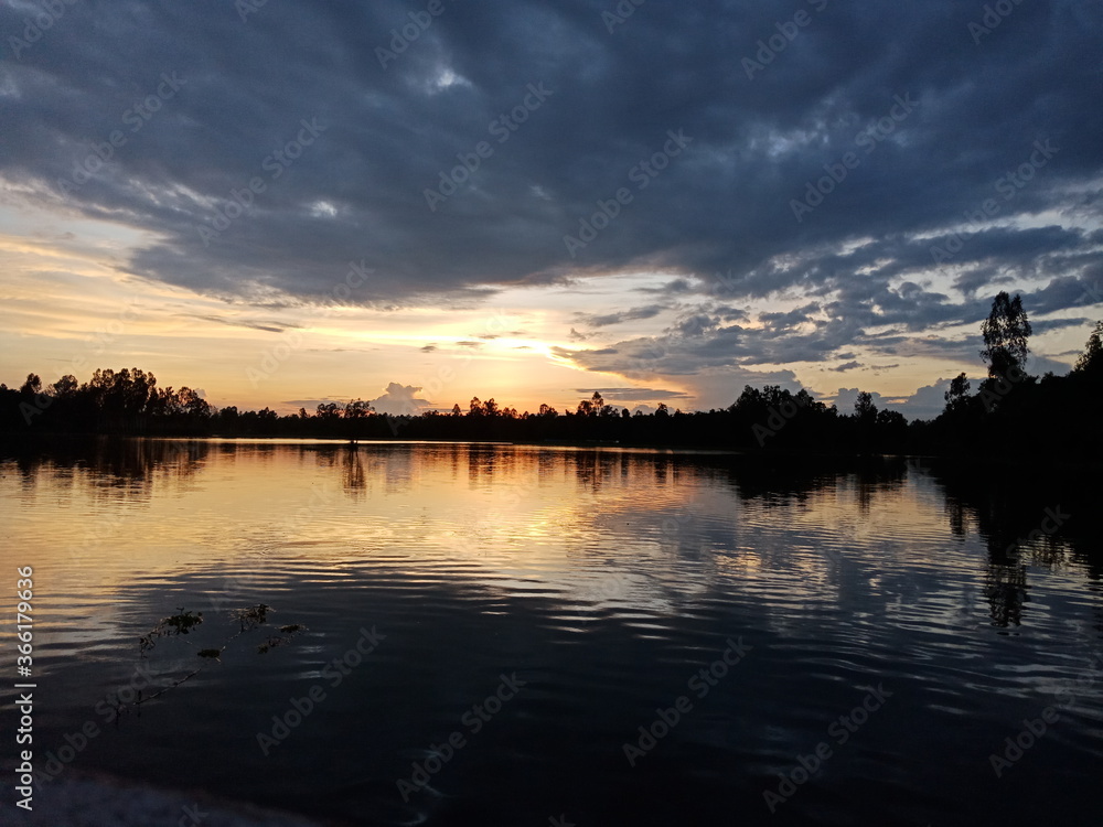 Naklejka premium sunset on the river