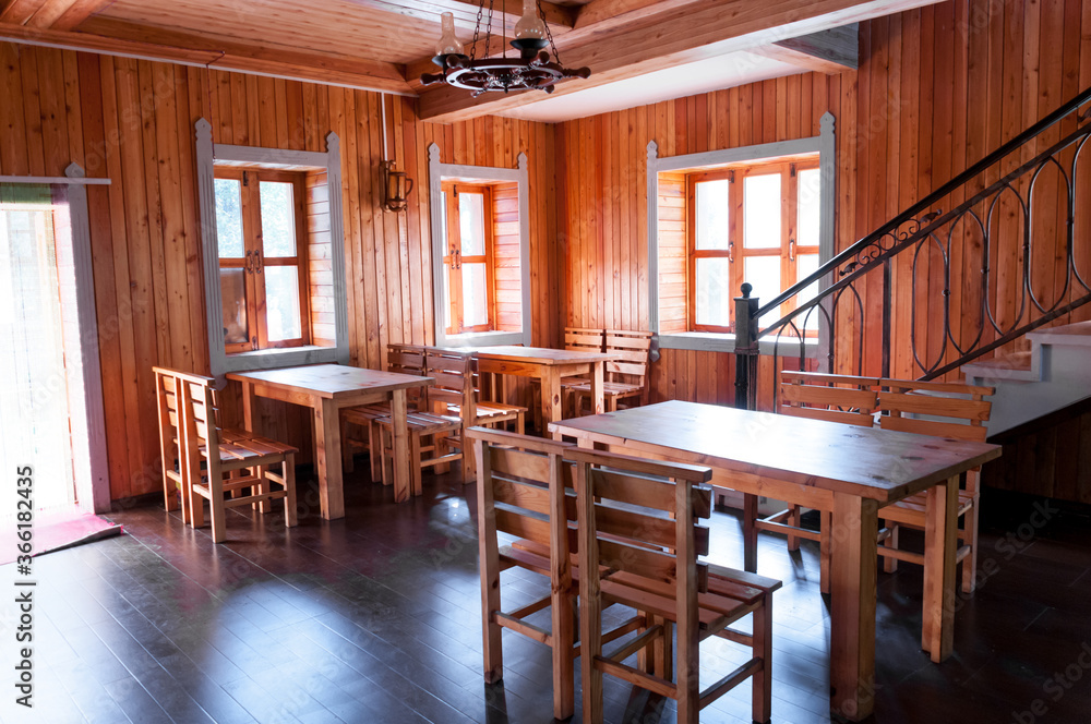 China, Heihe, July 2019: interior of a wooden bar at home in a Russian village outside the city of Heihe China, Heihe, July 2019: interior of a wooden bar at home in a Russian village outside the city of Heihe