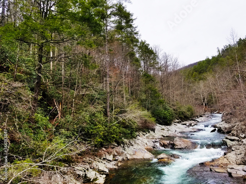 Cascading water through the mountain in autumn