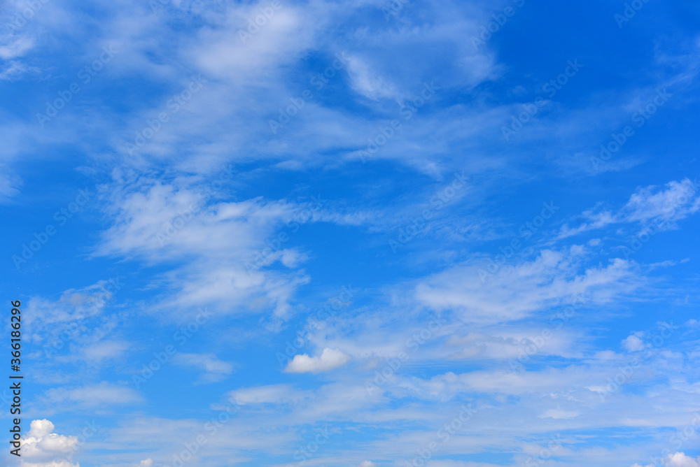 Naklejka premium Blue sky with white clouds for texture background.