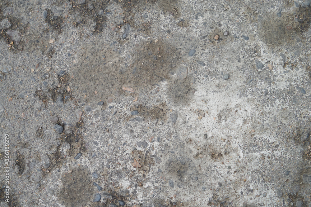 Gray asphalt texture with cracks. Background texture
