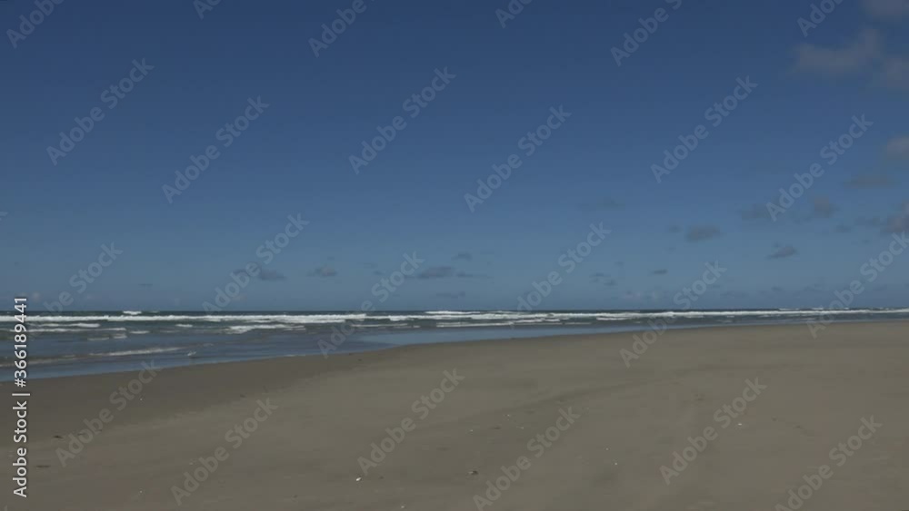 The beach and the Siuslaw River along the Oregon coast near Harbor Vista, Oregon, at the Siuslaw North Jetty. The beach and the Siuslaw River along the Oregon coast near Harbor Vista, Oregon, at the Siuslaw North Jetty.