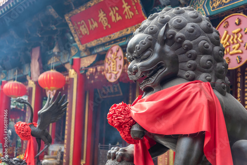 Chinese lion statue in Chinese temple in Hong Kong