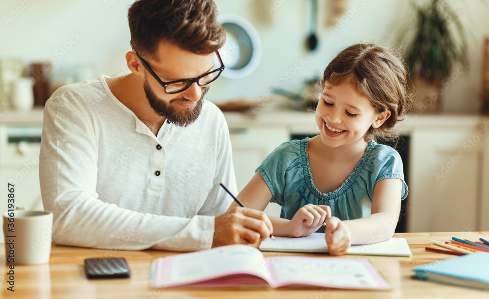 Father helping daughter with homework. - obrazy, fototapety, plakaty 