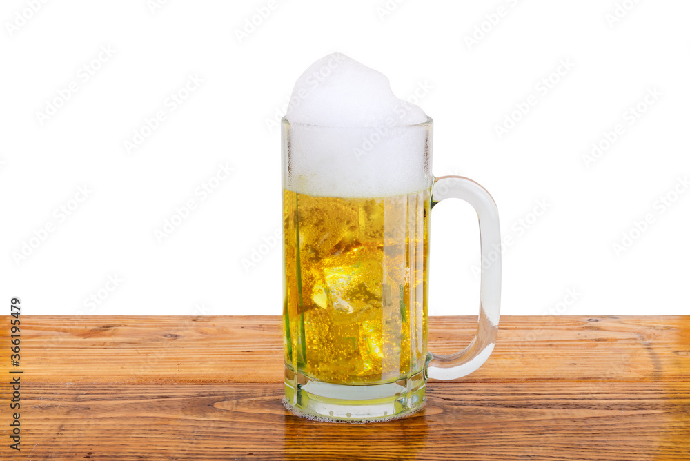 The glass of cold beer on the table The glass of cold beer on the table