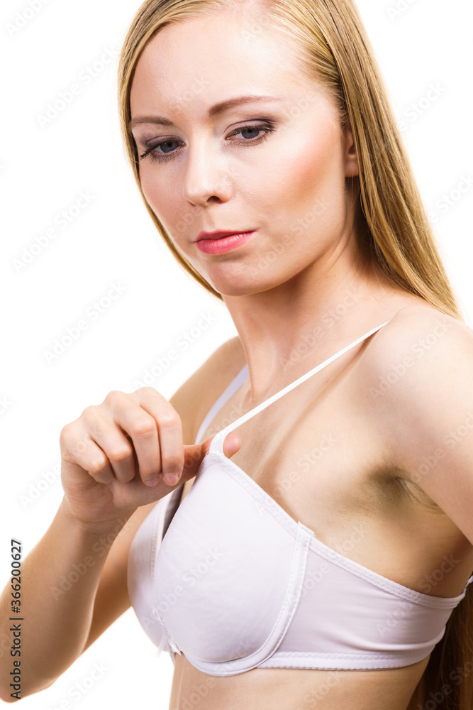 Woman wearing too big bra Stock Photo
