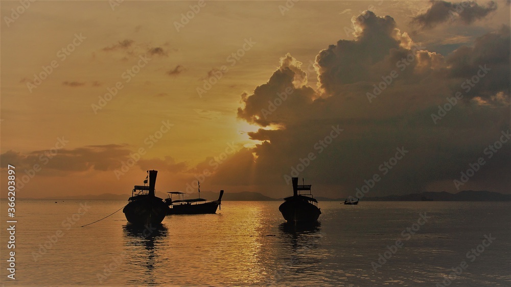 fishing boats at sunset Krabi Thailand