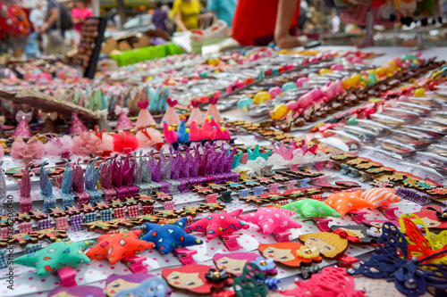 close up to variety colourful hair clip on the kiosk board at the korea shopping street.