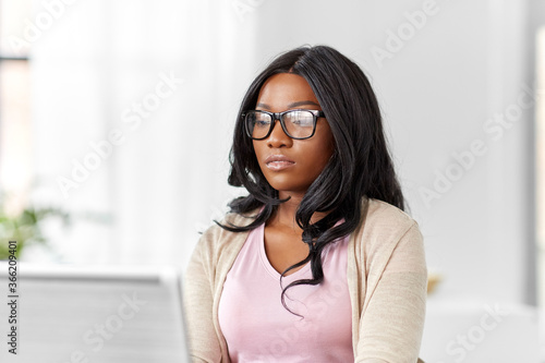 Photography remote job, business and e-learning concept - young african american woman in gl