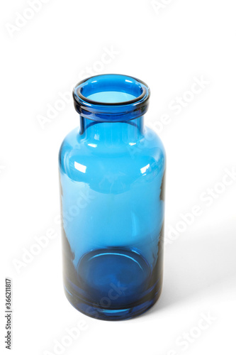 Blue glass bottle isolated on white background