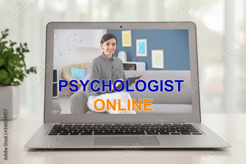 Online consultation with psychologist via modern laptop at home