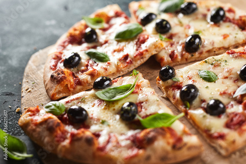 Delicious oven-fired pizza with olives