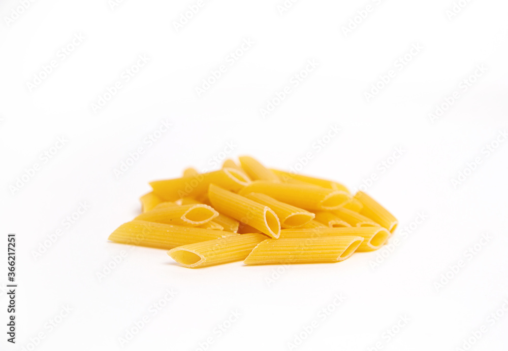 yellow pasta on white plate close up yellow pasta on white plate close up
