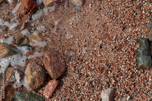 Red Sand and Stones of the red Sea Coast, Natural Texture Background