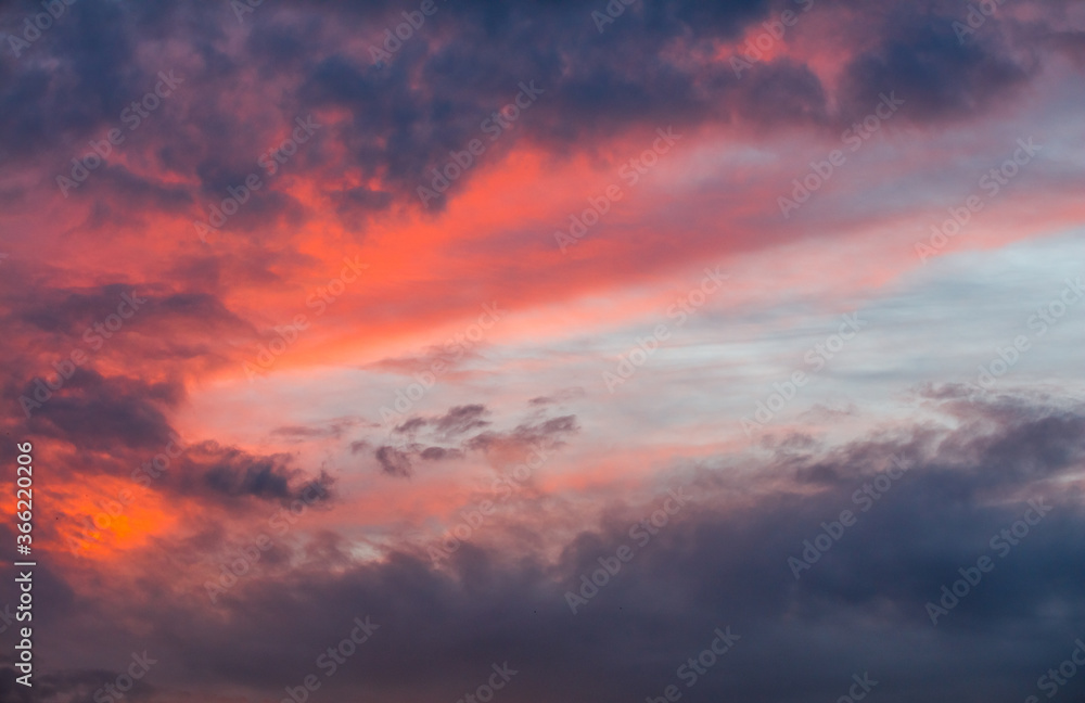 Evening dramatic sky with red clouds