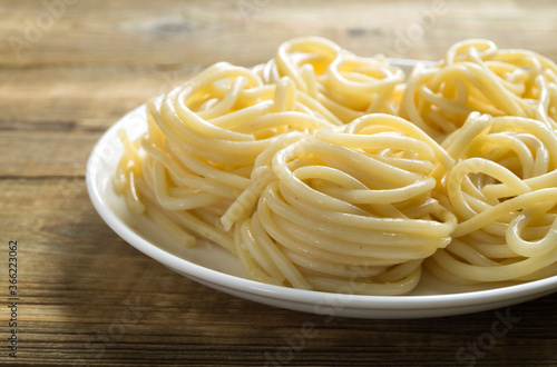 spaghetti on a white plate.