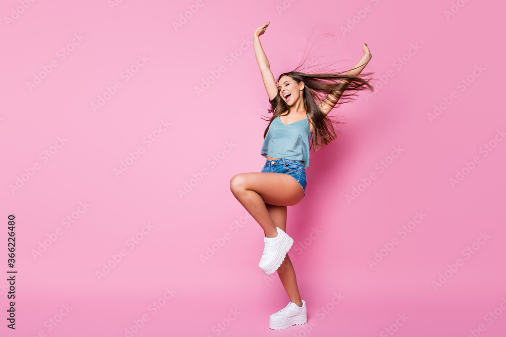 Full size photo of candid crazy girl rest relax spring free time weekend raise hands scream wear good look clothes isolated over pastel color background