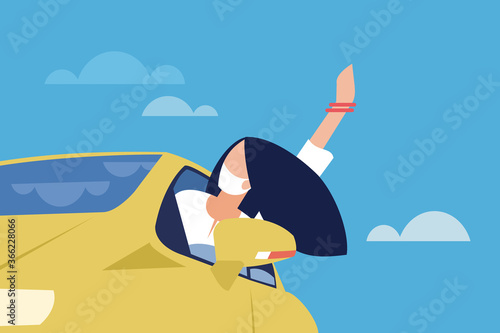 A girl wearing mask waving her hand out of a moving car window