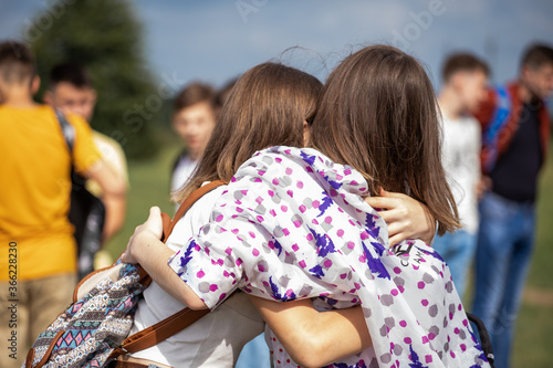 young women happy to meet