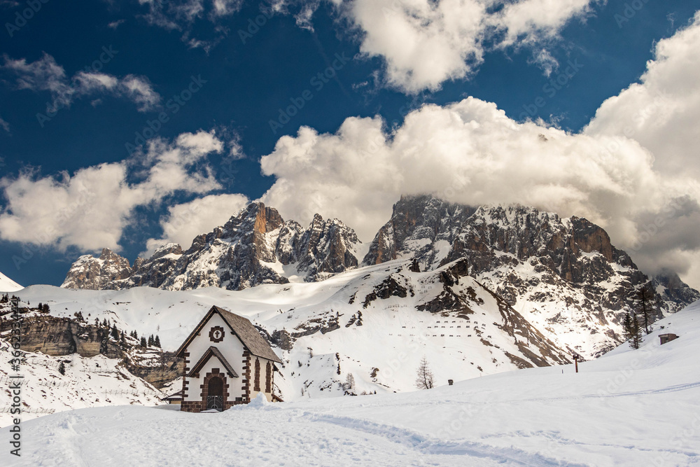 Majestic cloudy alpine mountains in Pale di San Martino, Dolomites, Italy
